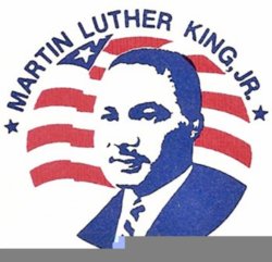 Picture of Martin Luther King with a flag in the background.